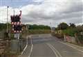Lorry stuck on level crossing closes train line