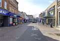 Man punched and kicked by gang in high street robbery