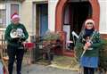 Neighbours raise festive spirits with music from their doorsteps