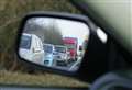 Jackknifed lorry blocks road