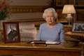 Queen surrounded by wartime mementos during VE Day anniversary address