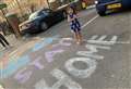 Schoolgirl's street art reminder to 'stay home'