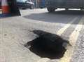 10ft deep hole opens up in high street