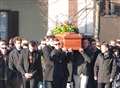 Mourners line streets to pay tribute to waiter killed in flat