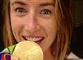 Joy as gold medallist gets flight to parade