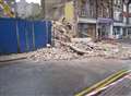 Terror as building collapses into street