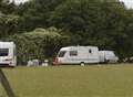 Travellers 'threaten people' and leave rubbish over field