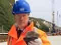 Yobs hurl rocks at rail workers from cliff