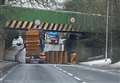 Traffic delays after skips fall off lorry 