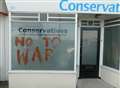 Vandal daubs anti-war graffiti on MP's office