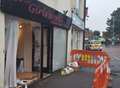Driver and passenger still fighting for life after car ploughs into salon