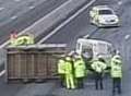 Delays as trailer overturns on M25