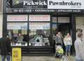 Pair charged over pawnbrokers raid