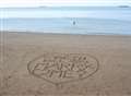 Proposal in the sand... mystery solved