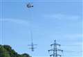 Helicopter dismantles huge old pylons in the air