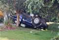 Woman hurt after Range Rover flips onto roof