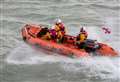 Pair cut off by tide rescued