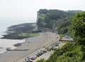 Body of missing man discovered below cliffs 