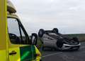 Emergency services called after car flips