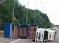 Delays clear after trailer overturns 
