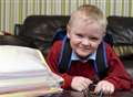 Brave boy returns to class after fighting back from brink of death