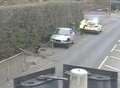 Car ploughs into road barriers