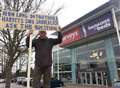 Dad-of-two stages protest outside furniture store