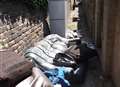 Dumped: Two sofas, fridge-freezer and pile of rubbish