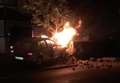 Car smashes into wall and bursts into flames