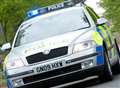 Motorcyclist injured in collision with police car