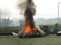 Car engulfed by flames