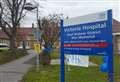 Blue decorations adorn entrance to hospital 