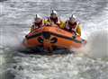 Trio rescued after cruiser 'disappears' beneath them