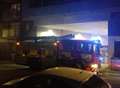 Suspicious bin fire at town centre flats