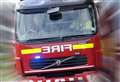 Firefighters tackle shed on fire