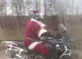 Santa swaps his sleigh for a motorbike