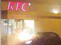 Video: Car bursts into flames outside KFC