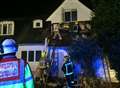 Hotel evacuated after thatched roof fire