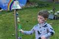 Three-year-old marks end of cancer treatment with family as bell moved outside