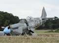 Spitfire crash lands in field