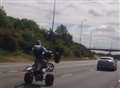 Video: 'Idiot' quad bike rider performs high-speed wheelie on A2 
