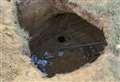 Dog walkers’ fears as giant hole dug by yobs