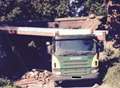 Road closed after lorry smashes into bridge