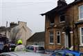 Woman dies in house fire 