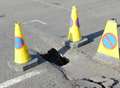 Busy street closed after hole opens in road