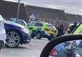 Two arrests as armed police storm road