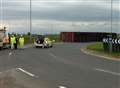 Lorry overturns at roundabout