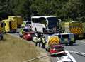 Coach driver charged over double death crash