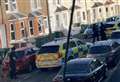 Armed police storm street