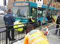 Woman injured in bus crash